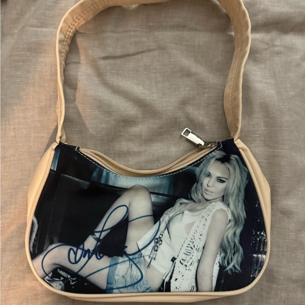 Praying Purse Lindsay Lohan
